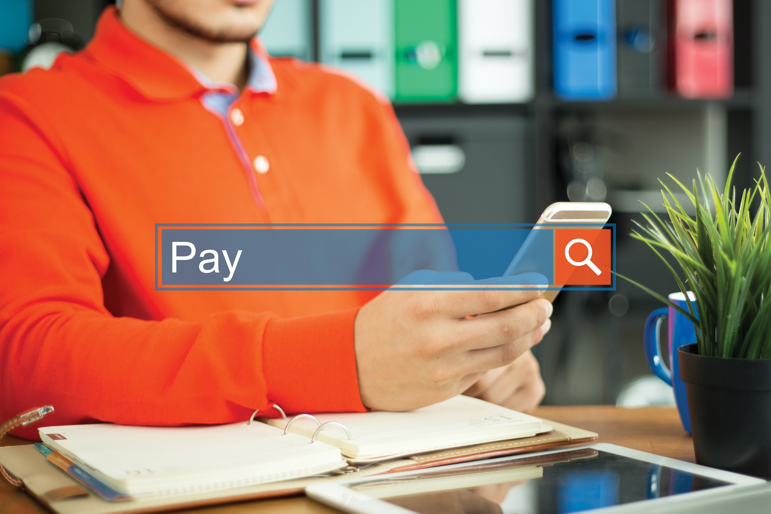 Young Man Using Smartphone And Searching Pay Word On Internet